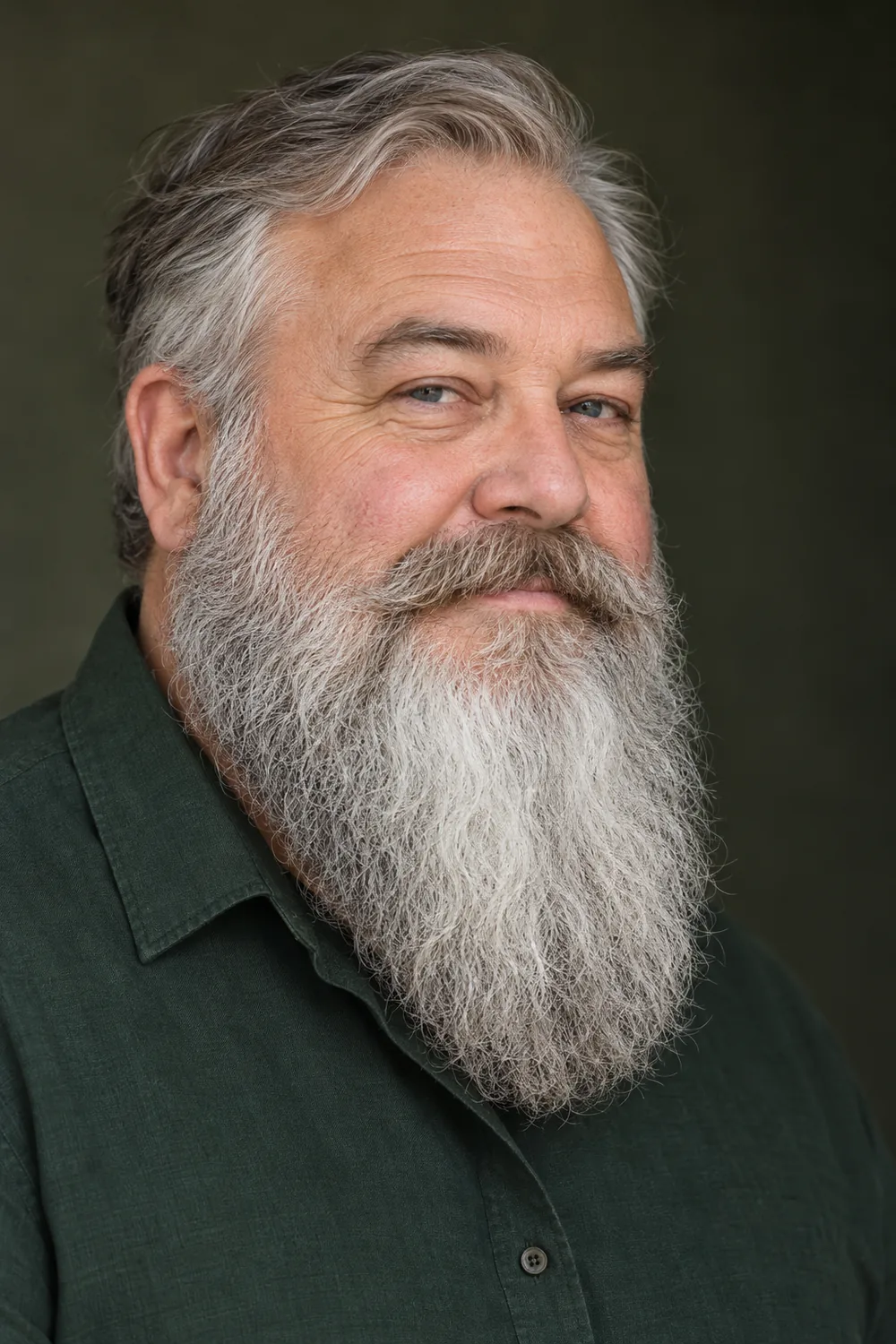 Fictional older adult man with a round face and a long, full white-and-gray beard ending in a broad rounded tip.