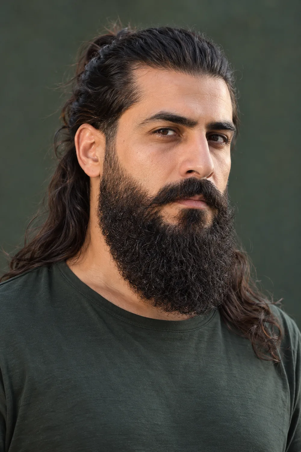Fictional adult man with long dark hair tied back and a dense curly beard with high clean cheek lines and a connected mustache.